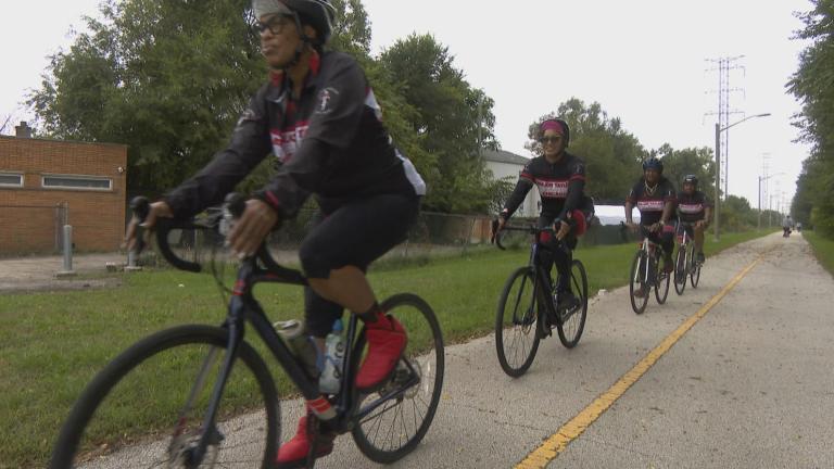 Members of the Major Taylor Cycling Club ride their bikes along the trail. (WTTW News)