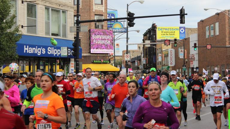 Runners participate in the 2012 Chicago Marathon near the intersection of Clark Street and Diversey Parkway. (Benjamin Lipsman / Flickr)