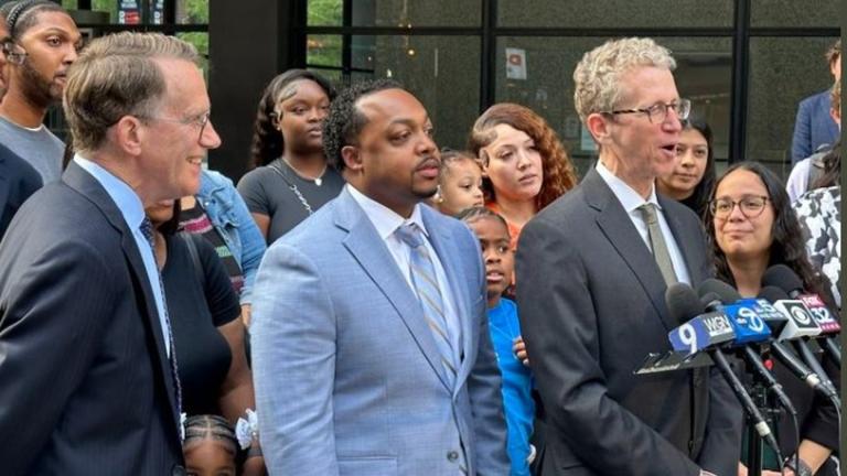 Marcel Brown, center, listens as his attorneys address the news media on Monday, Sept. 9, 2024, after a federal jury awarded him $50 million in a case that claimed the Chicago Police Department violated his constitutional rights. (Courtesy of Loevy and Loevy) Marcel Brown, center, listens as his attorneys address the news media on Monday, Sept. 9, 2024, after a federal jury awarded him $50 million in a case that claimed the Chicago Police Department violated his constitutional rights. (Courtesy of Loevy and Loevy)