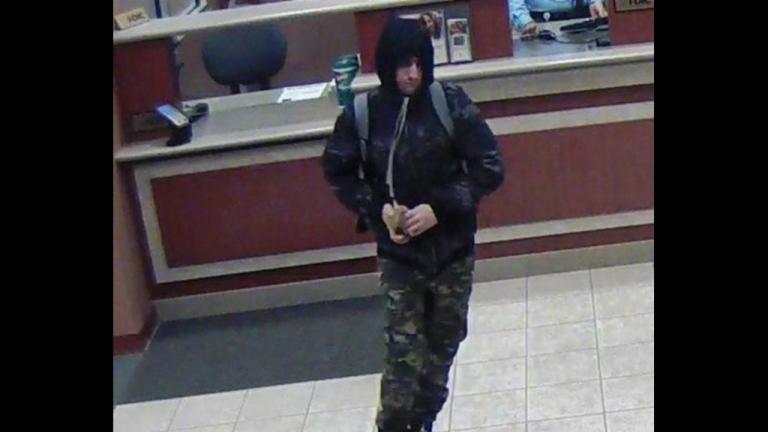 Surveillance footage shows the suspect in three Chicago bank robberies. Authorities believe that man is Matthew Silberman. (FBI)