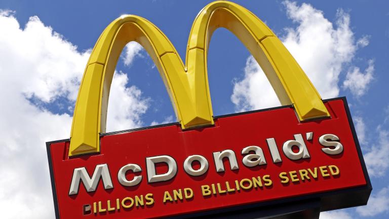 This June 25, 2019 file photo shows a McDonald's sign outside the restaurant in Pittsburgh. More than 50 Black former McDonald’s franchise owners are suing the burger chain for discrimination. (AP Photo/Gene J. Puskar, File)