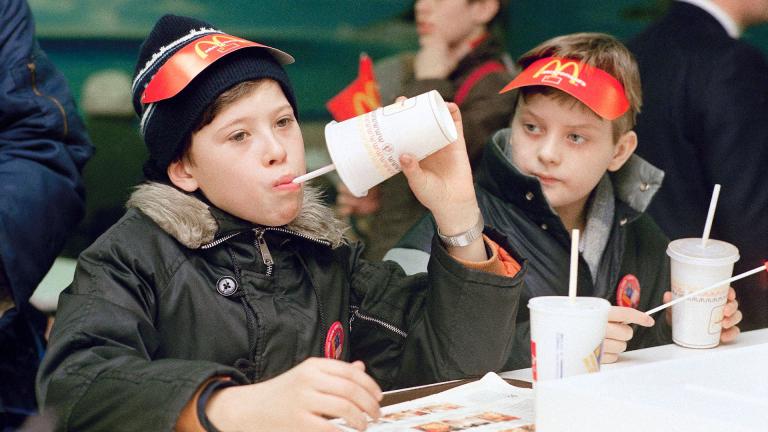 Young Muscovites checks out a new taste sensation for the Soviet Union, hamburgers and soft drinks in Moscow on Jan. 31, 1990. McDonald’s said Thursday, May 19, 2022, it has begun the process of selling its Russian business to one of its licensees in the country. (AP Photo / Rudi Blaha, File)