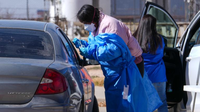 FILE - A health worker administers a measles test on Fernando Tarin, of Seagraves, Texas, at a mobile testing site outside Seminole Hospital District, Friday, Feb. 21, 2025, in Seminole, Texas. (Julio Cortez / AP Photo, File)