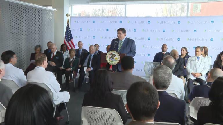 Gov. J.B. Pritzker, joined by members of the state’s Democratic congressional delegation, speaks about potential Medicaid cuts during a news conference at UI Health on the Near West Side on Feb. 28, 2025. (WTTW News)