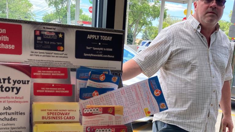 A customer walks in to the Speedway gas station in Des Plaines, Ill., where the winning Mega Millions lottery ticket was sold, Saturday, July 30, 2022. (AP Photo / Nam Y. Huh)