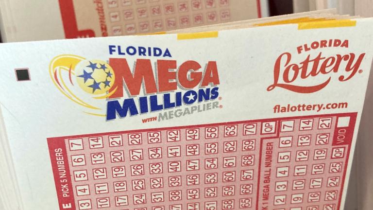 Mega Millions lottery playing slips are shown at a supermarket kiosk, Monday, Jan. 2, 2023, in Surfside, Fla. The jackpot for the Tuesday drawing is estimated at $785 million. (AP Photo / Wilfredo Lee)