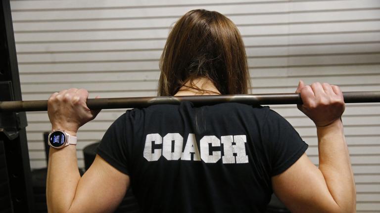 Melissa Breaux Bankston, a CrossFit athletic trainer at CrossFit Algiers in New Orleans, poses for a portrait at the gym Monday, Dec. 23, 2019. She participates in an intermittent fasting diet. (AP Photo / Gerald Herbert)