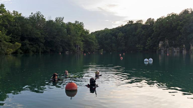 Divers from Great American Divers in St. Charles, Missouri, practice at Mermet Springs on July 17, 2026, in Belknap, Illinois. (Peyton Cook / Saluki Local Reporting Lab)