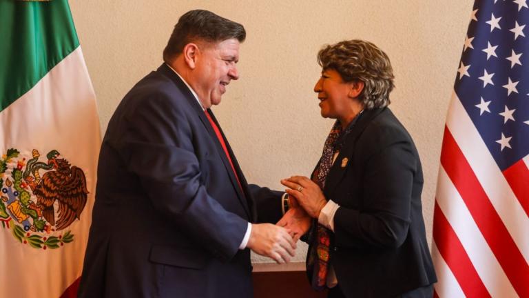 Gov. J.B. Pritzker, left, shakes hands with Mexico state Gov. Delfina Gómez Álvarez, right, after the two states signed a memorandum of understanding. (Photo provided by Gov. J.B. Pritzker’s office)