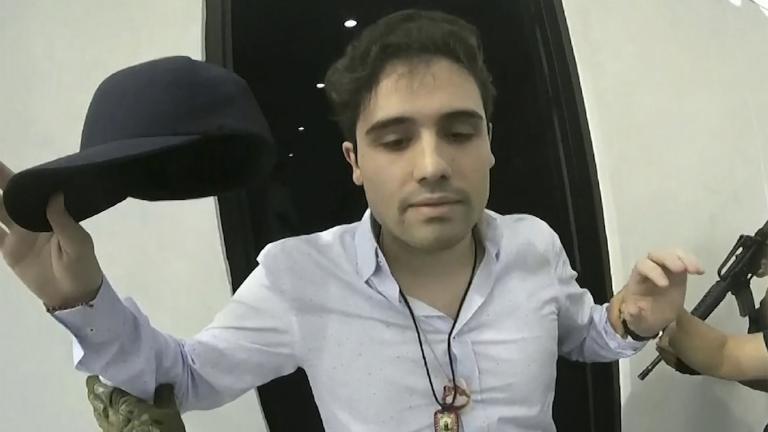 This frame grab from video, provided by the Mexican government, shows Ovidio Guzmán López being detained in Culiacan, Mexico, Oct. 17, 2019. (CEPROPIE via AP File)