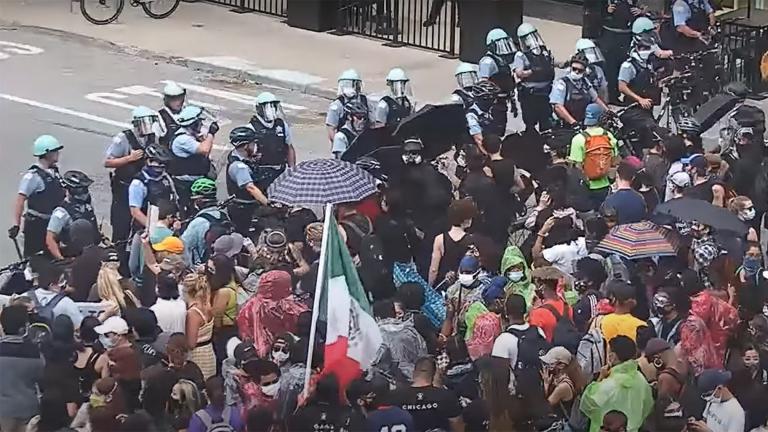 A still image taken from a video released by the Chicago Police Department shows a confrontation between protesters and police at Michigan Avenue and Wacker Drive on Saturday, Aug. 15, 2020. (WTTW News via CPD)