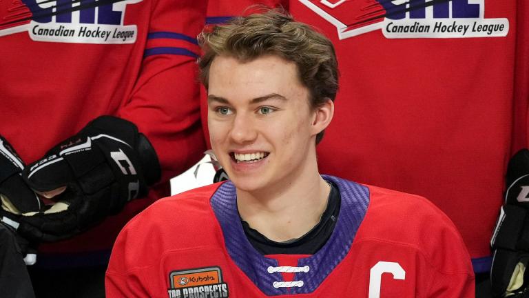 Regina Pats’ Connor Bedard smiles for a team photo ahead of the CHL/NHL Top Prospects game, in Langley, British Columbia, Wednesday, Jan. 25, 2023. (Darryl Dyck / The Canadian Press via AP, File)