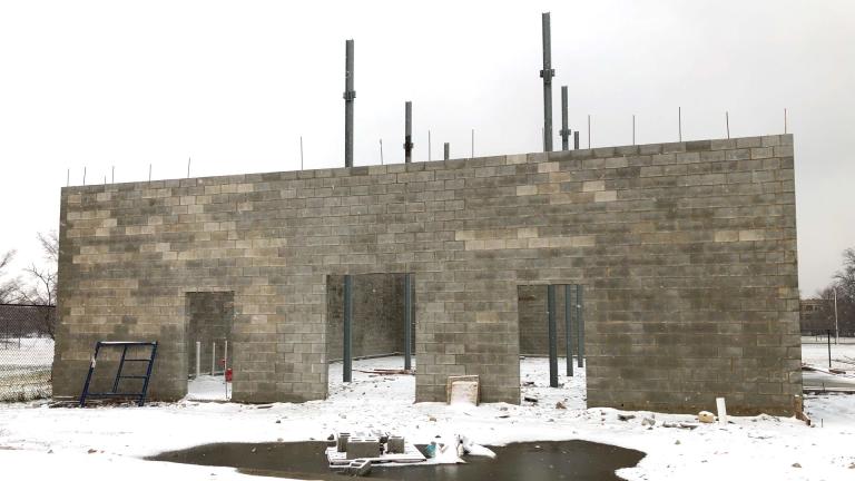 The cinderblock shell of the National Museum of Puerto Rican Arts and Culture's proposed archive building in Humboldt Park. (Patty Wetli / WTTW News)