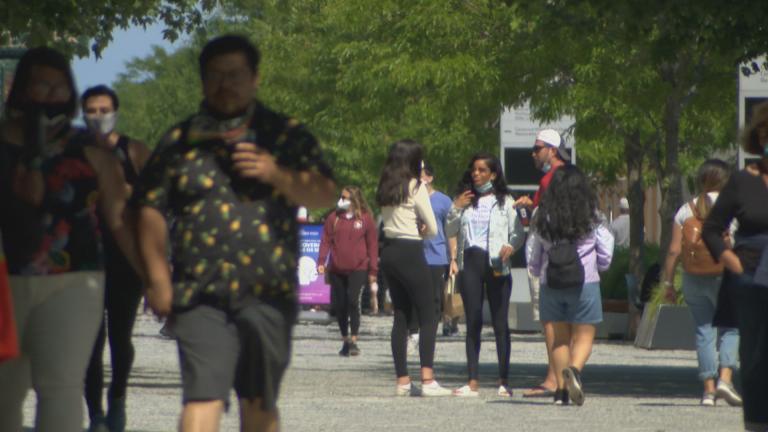 Visitors to Navy Pier take advantage of blue skies Friday, June 12, 2020. The popular tourist attraction reopened, with restrictions, on Wednesday, June 10. (WTTW News)