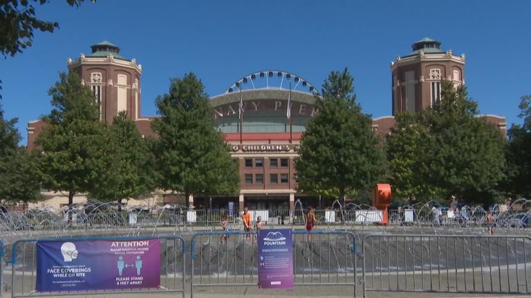 Children play in the fountain at Navy Pier on Tuesday, Aug. 18, 2020, the day pier officials announced the attraction will temporarily close in September because of the coronavirus pandemic. (WTTW News)
