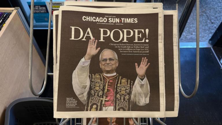 Chicago Sun Times newspaper front page showing Pope Leo XIV is seen on a newspaper rack at a store, Friday, May 9, 2025, in Chicago. (AP Photo / Melina Walling)