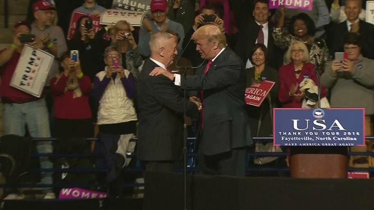 Donald Trump shakes the hand of retired Marine Gen. James Mattis. (Courtesy of CNN)