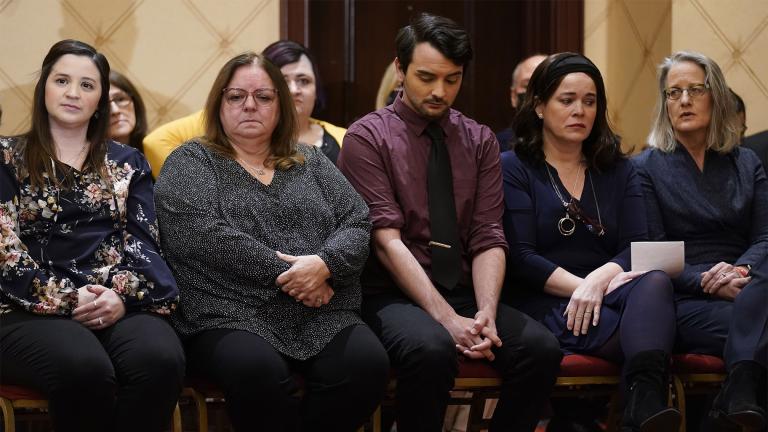 Families of the victims of the Newtown shooting and attorneys listen during a news conference in Trumbull, Conn., Tuesday, Feb. 15, 2022.  (AP Photo / Seth Wenig)