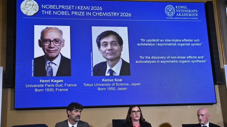 Portraits of Henri Kagan and Kenso Soai are shown on the screen as they are awarded the 2026 Nobel Prize in Chemistry, at the Royal Swedish Academy of Sciences in Stockholm, Sweden, on Oct. 7, 2026. Photo: (Fredrik Sandberg / TT News Agency via AP)