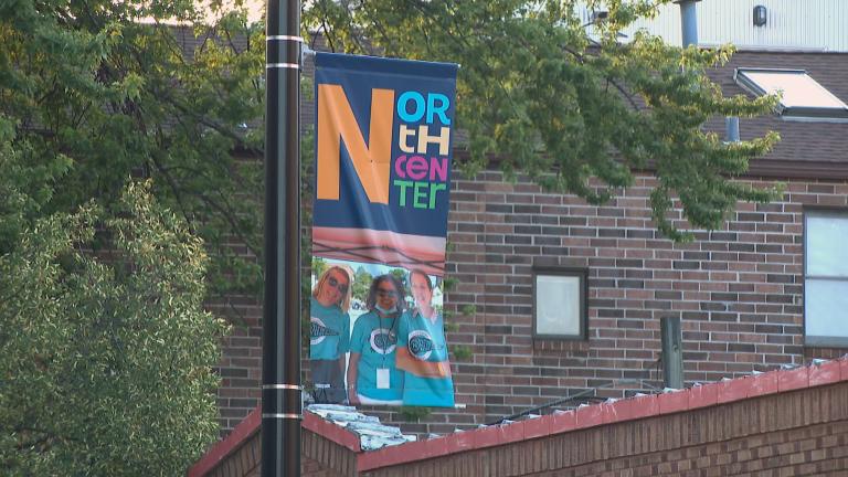 A colorful banner welcomes visitors to North Center (WTTW News)