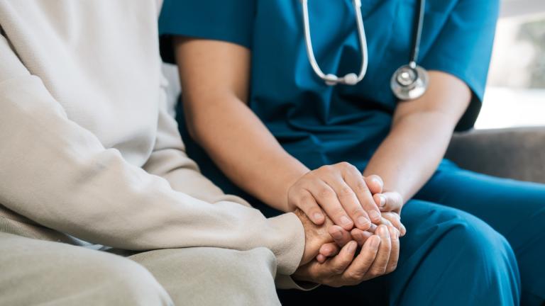 A nursing home resident and nurse are pictured in a file photo. (Sakorn Sukkasemsakorn / iStock)