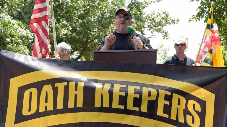 Stewart Rhodes, founder of the Oath Keepers, center, speaks during a rally outside the White House in Washington, June 25, 2017. (AP Photo / Susan Walsh, File)