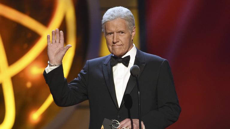 This May 5, 2019, file photo shows Alex Trebek gestures while presenting an award at the 46th annual Daytime Emmy Awards in Pasadena, Calif. (Photo by Chris Pizzello / Invision / AP, File)