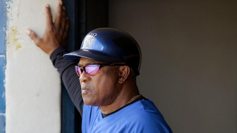 New York Mets coach Sandy Alomar Sr. watches from the dugout as the Mets play the Cleveland Indians in a spring training baseball game, March 7, 2008, in Winter Haven, Fla. (AP Photo / Tony Dejak, File)