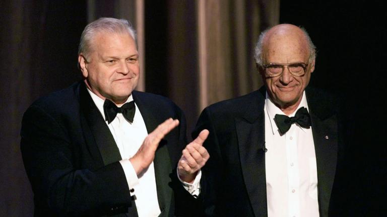 In this June 6, 1999 file photo, actor Brian Dennehy, left, applauds playwright, Arthur Miller, before awarding him the Lifetime Achievement Award at the Tony Awards in New York. (AP Photo / Kathy Willens, File)