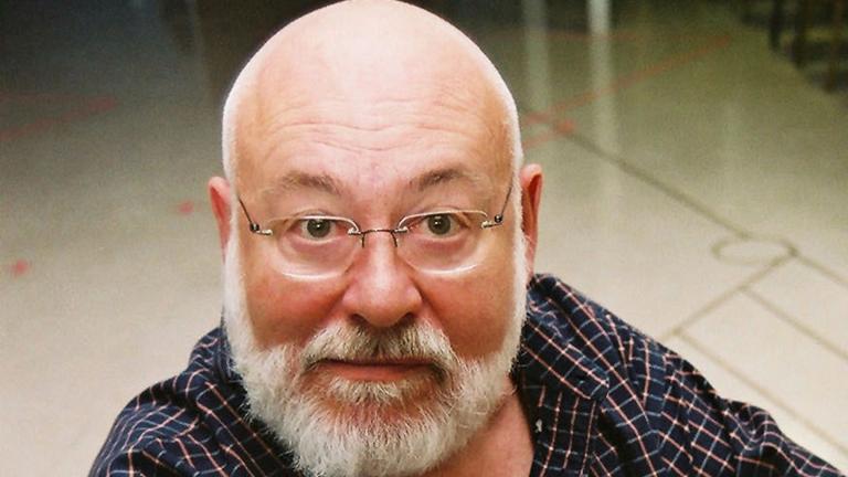 Writer and director Frank Galati poses for a portrait on July 29, 2004, in a practice room at the Oregon Shakespeare Festival in Ashland, Ore., where his play “Oedipus Complex” premiered during the summer. (AP Photo / Jeff Barnard, File)