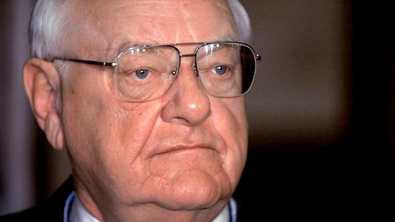 Gov. George Ryan speaks with reporters at the Capitol in Springfield, Ill, on May 22, 2002. (AP Photo / Seth Perlman)