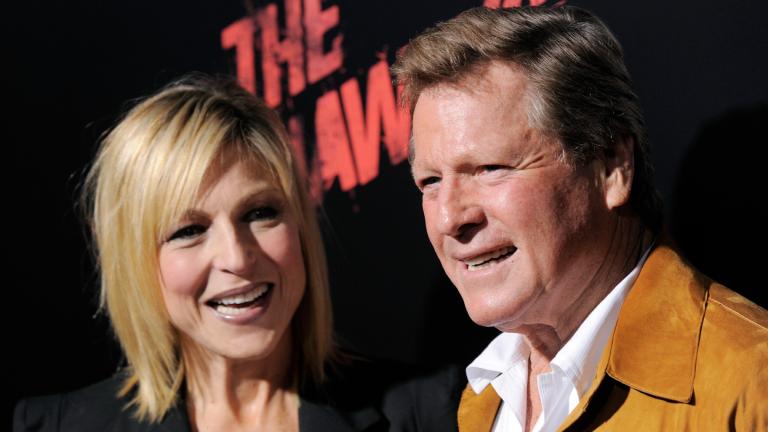 FILE - Tatum O’Neal, left, a cast member in “The Runaways,” and her father, actor Ryan O’Neal, pose together at the premiere of the film in Los Angeles, Thursday, March 11, 2010. (Chris Pizzello / AP Photo, File)