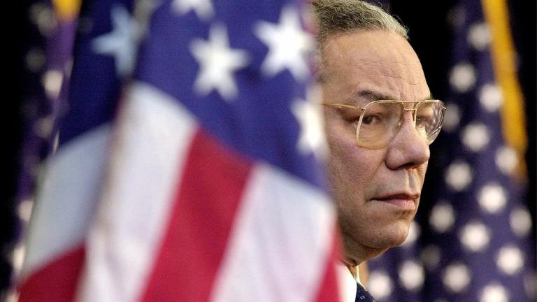 In this Feb. 15, 2001 file photo, Secretary of State Colin Powell looks on as President Bush addresses State Department employees at the State Department in Washington. (AP Photo/Kenneth Lambert) In this Feb. 15, 2001 file photo, Secretary of State Colin Powell looks on as President Bush addresses State Department employees at the State Department in Washington. (AP Photo/Kenneth Lambert)