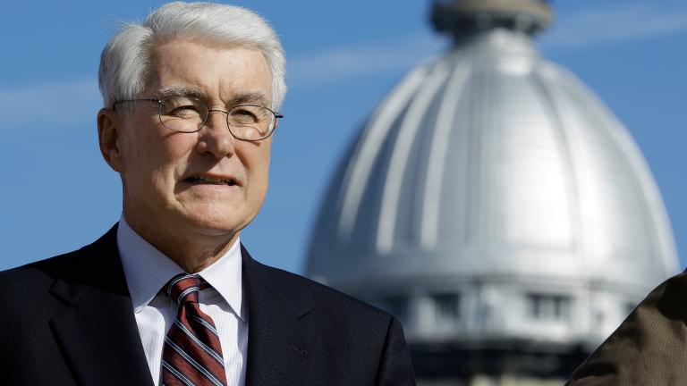 Former Illinois Gov. Jim Edgar speaks during a campaign rally outside the state Capitol on Nov. 3, 2014, in Springfield, Ill. (AP Photo/Seth Perlman, File)