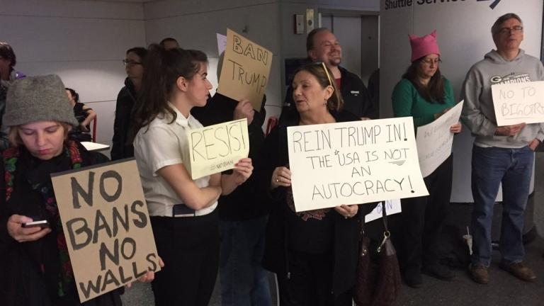 Protesters gather at O’Hare airport Saturday afternoon. (Paris Schutz / Chicago Tonight)