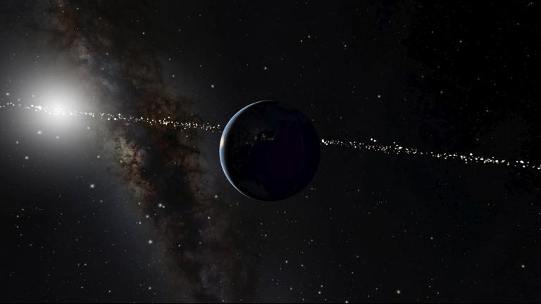 This illustration provided by the American Museum of Natural History depicts the planet Earth, center, with the Sun in the background. The line of spots across the center of the image indicates star systems which can see Earth as it goes in front of our Sun. (OpenSpace / American Museum of Natural History via AP)