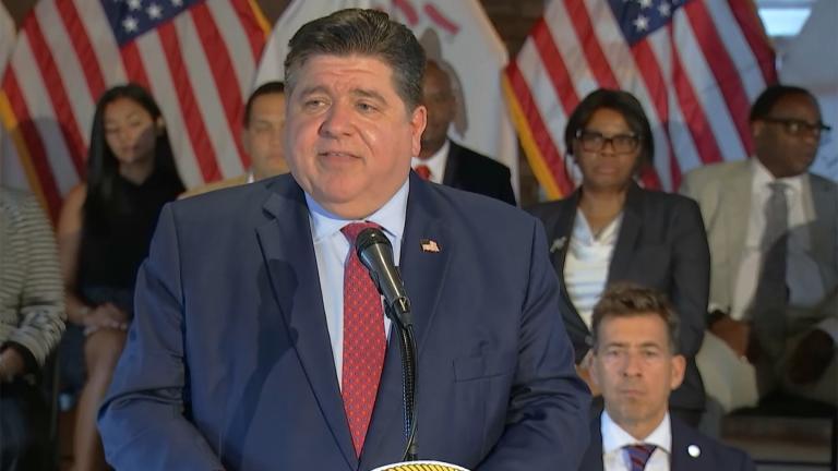 Gov. J.B. Pritzker speaks at a news conference in Chicago on Aug. 6, 2024, prior to signing a bill aimed at giving more Illinoisans who leave a correctional facility access to a free state ID. (Credit: Illinois.gov)