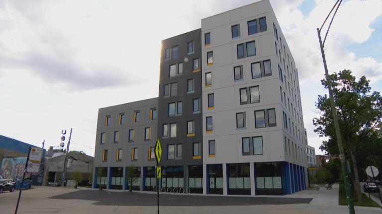 The Lucy Gonzalez Parsons apartments opened in May 2022 near the Logan Square Blue Line station. (WTTW News)