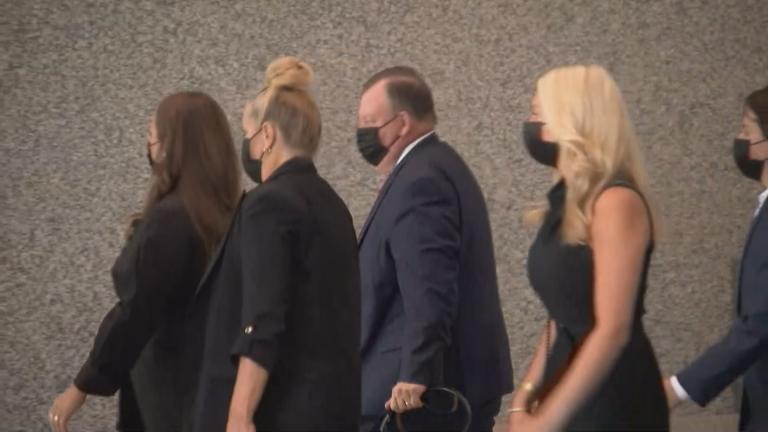Flanked by relatives and friends, former Ald. Patrick Daley Thompson (11th Ward) arrives on July 6, 2022 at the Dirksen Federal Courthouse Wednesday for his sentencing for lying to federal agents and filing false tax returns. (WTTW News) 
