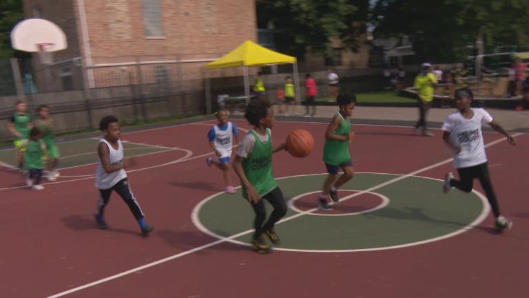 Children playing at a “Light in the Night” event. (WTTW News)