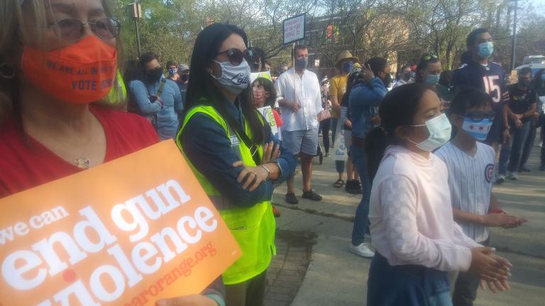 Community members take part in a peace walk in Albany Park to address gun violence on Sunday, Sept. 20, 2020. (Annemarie Mannion / WTTW News)