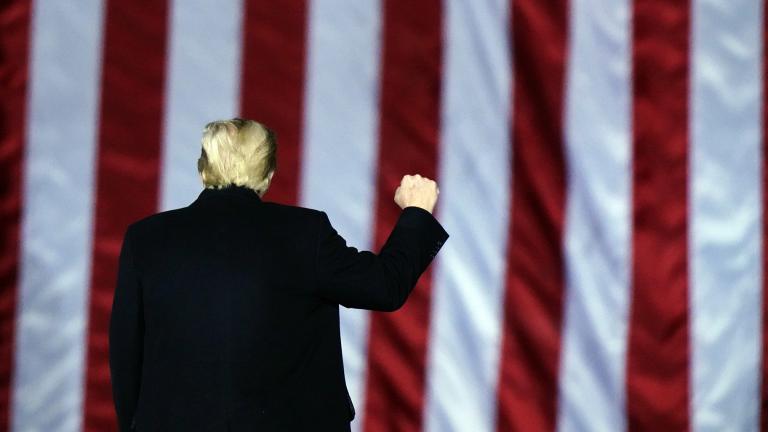 President Donald Trump gestures at a campaign rally in support of U.S. Senate candidates Sen. Kelly Loeffler, R-Ga., and David Perdue in Dalton, Ga., Monday, Jan. 4, 2021. (AP Photo / Brynn Anderson)