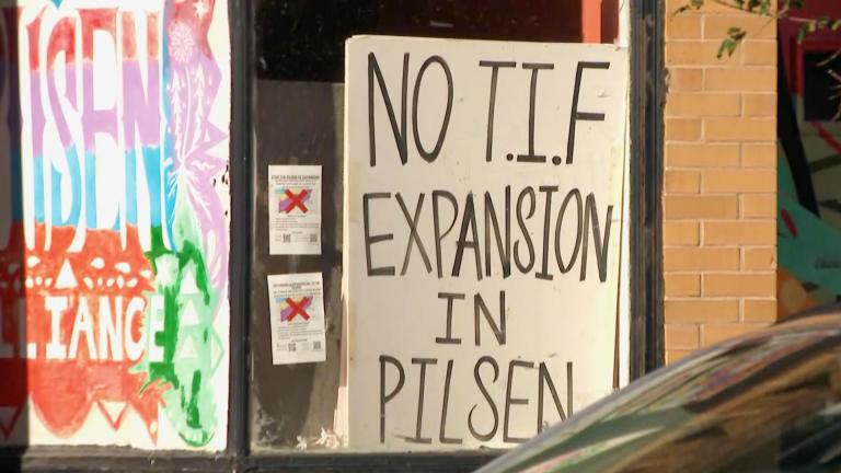 File photo of a sign opposing the expansion of a TIF district in Pilsen. (WTTW News)