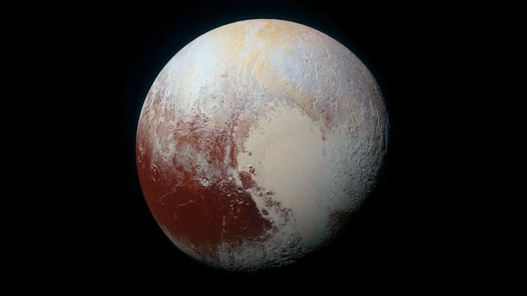 NASA’s New Horizons spacecraft captured this high-resolution enhanced color view of Pluto on July 14, 2015.