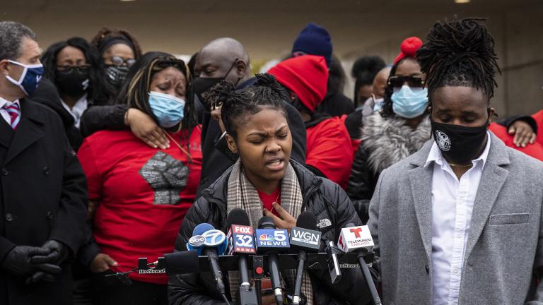 Clifftina Johnson (back, left), Tafara Williams’ mother, cries as her daughter, Sasha Williams, sings during a press conference outside Waukegan’s city hall complex, Tuesday morning, Oct. 27, 2020. (Ashlee Rezin Garcia / Chicago Sun-Times via AP) Clifftina Johnson (back, left), Tafara Williams’ mother, cries as her daughter, Sasha Williams, sings during a press conference outside Waukegan’s city hall complex, Tuesday morning, Oct. 27, 2020. (Ashlee Rezin Garcia / Chicago Sun-Times via AP)