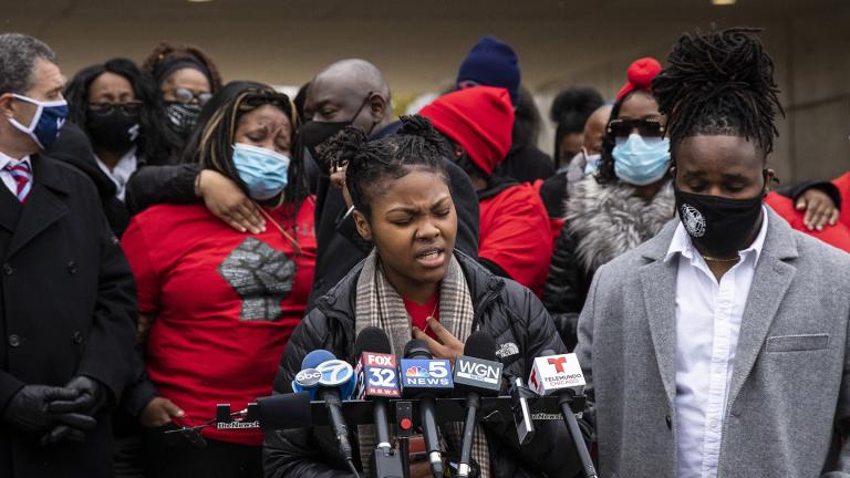 Clifftina Johnson (back, left), Tafara Williams’ mother, cries as her daughter, Sasha Williams, sings during a press conference outside Waukegan’s city hall complex, Tuesday morning, Oct. 27, 2020. (Ashlee Rezin Garcia / Chicago Sun-Times via AP)