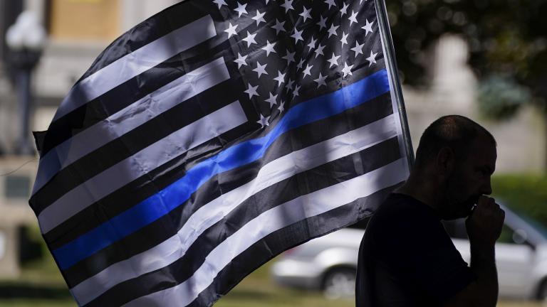 An unidentified man participates in a Blue Lives Matter rally Sunday, Aug. 30, 2020, in Kenosha, Wis. (AP Photo / Morry Gash)