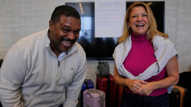 Rocky Mount Police Department Capt. James Staten, left, and Luann Pannell, director of instructional design and academic innovation with the Policing Leadership Academy, participate in an improvisational exercise lead by The Second City instructors during a Univeristy of Chicago Crime Lab class that is part of the Leadership program, on April 11, 2025, in Chicago. (AP Photo / Erin Hooley)