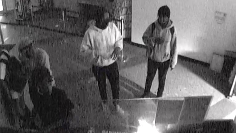 Security footage released by the U.S. Postal Inspection Service captured burglary suspects entering the office at 100 W. Randolph St. in Chicago on May 22, 2023. (Credit: U.S. Postal Inspection Service)