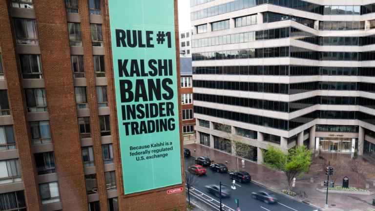 FILE - An advertisement for prediction market platform Kalshi hangs at 13th and L Streets in northwest Washington, April 1, 2026. (AP Photo / Allison Robbert, File)